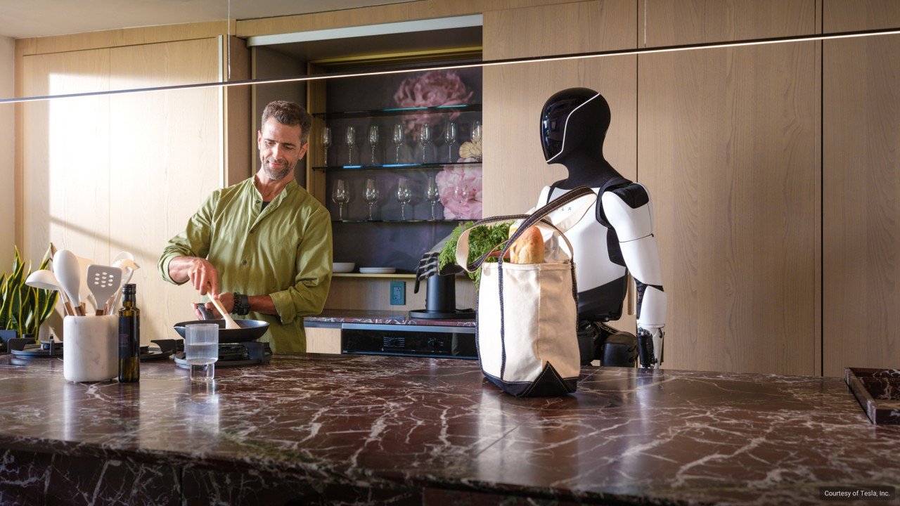 Tesla's Optimus robot in a kitchen. Courtesy of Tesla, Inc.